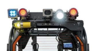 Různé bezpečnostní světelné systémy a Linde Reverse Assist Camera na elektrickém vysokozdvižném vozíku E14 s ochranou proti výbuchu od společnosti Linde Material Handling